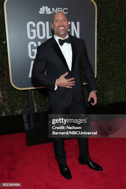 75th ANNUAL GOLDEN GLOBE AWARDS -- Pictured: Actor Dwayne Johnson arrives to the 75th Annual Golden Globe Awards held at the Beverly Hilton Hotel on...