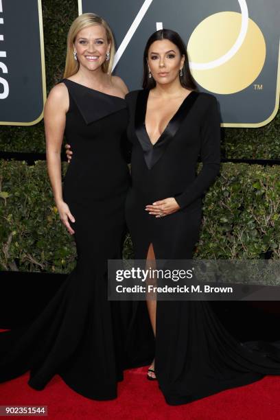 Reese Witherspoon and Eva Longoria attends The 75th Annual Golden Globe Awards at The Beverly Hilton Hotel on January 7, 2018 in Beverly Hills,...