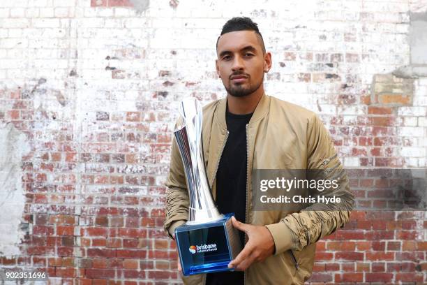 Brisbane International winner Nick Kyrgios poses with the trophy at the Brisbane Powerhouse on January 8, 2018 in Brisbane, Australia.