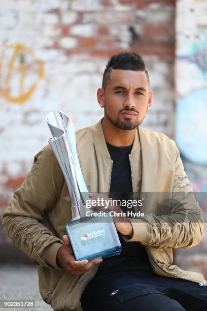 Brisbane International winner Nick Kyrgios poses with the trophy at the Brisbane Powerhouse on January 8, 2018 in Brisbane, Australia.