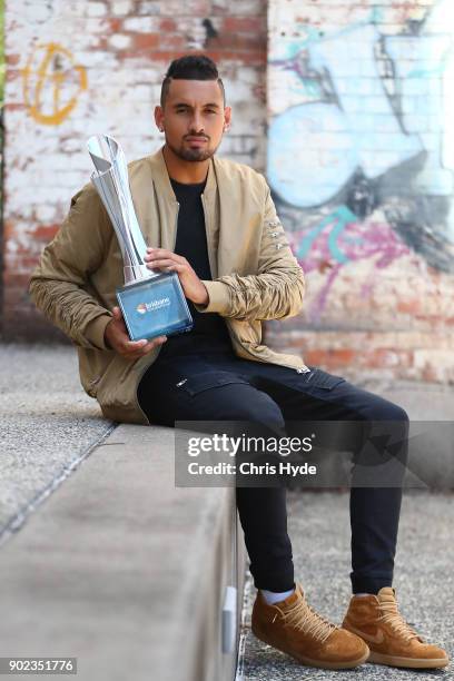 Brisbane International winner Nick Kyrgios poses with the trophy at the Brisbane Powerhouse on January 8, 2018 in Brisbane, Australia.