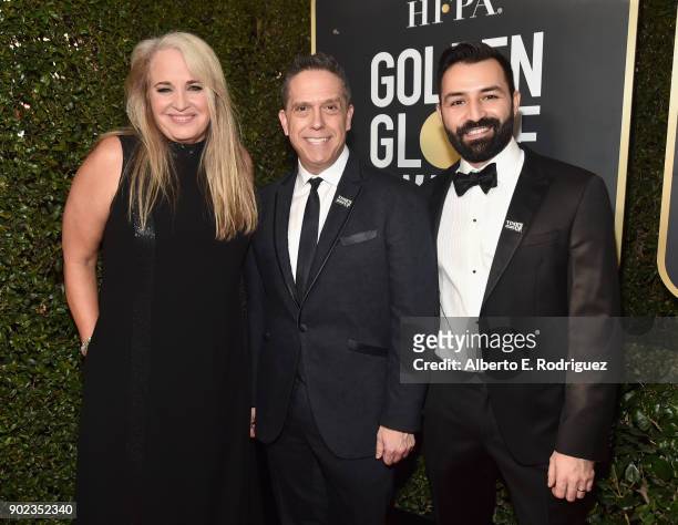 Darla K. Anderson, Lee Unkrich and Adrian Molina, of the film COCO attend The 75th Annual Golden Globe Awards at The Beverly Hilton Hotel on January...