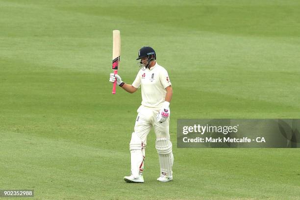 Joe Root of England celebrates and acknowledges the crowd after scoring a half century during day five of the Fifth Test match in the 2017/18 Ashes...