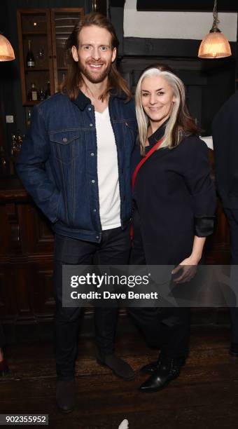 Craig McGinlay and Catherine Hayward attend the LFWM Official Party & Pub Lock-In during London Fashion Week Men's January 2018 at The George on...