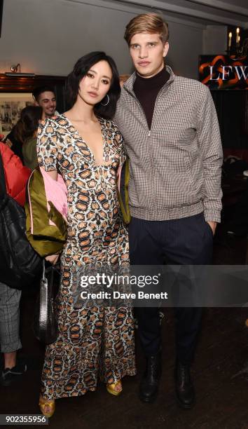 Betty Bachz and Toby Huntington-Whiteley attend the LFWM Official Party & Pub Lock-In during London Fashion Week Men's January 2018 at The George on...