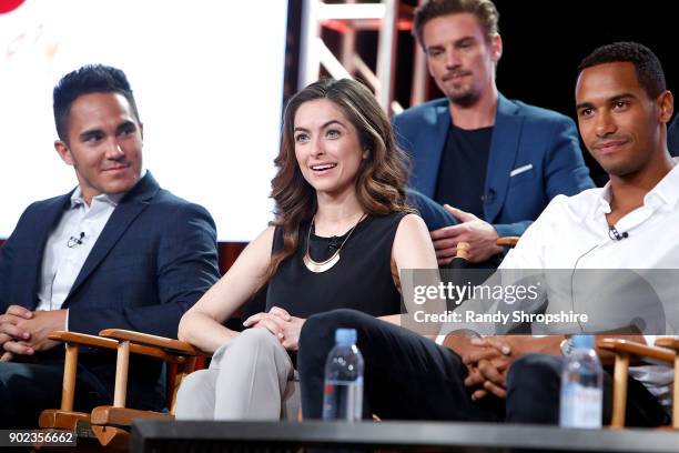 Actors Carlos PenaVega, Brooke Lyons, Riley Smith and Elliot Knight of the television show "Life Sentence" speak on stage during the CW portion of...