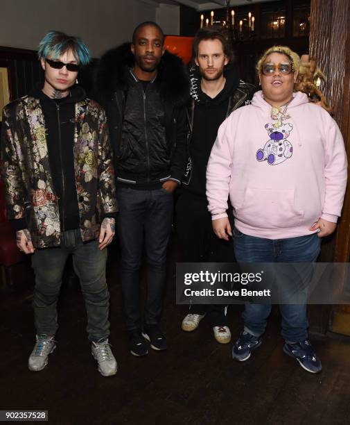 Bexey Swan, Emmanuel Ezugwu, Marc Jacques Burton and Fat Nick attend the LFWM Official Party & Pub Lock-In during London Fashion Week Men's January...