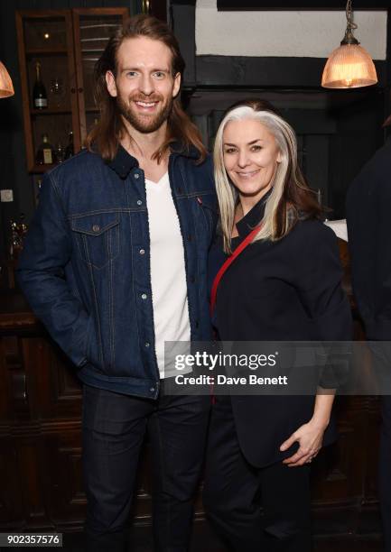 Craig McGinlay and Catherine Hayward attend the LFWM Official Party & Pub Lock-In during London Fashion Week Men's January 2018 at The George on...