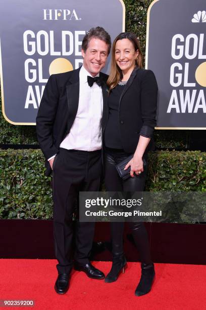 Actor Hugh Grant and Anna Eberstein attend The 75th Annual Golden Globe Awards at The Beverly Hilton Hotel on January 7, 2018 in Beverly Hills,...