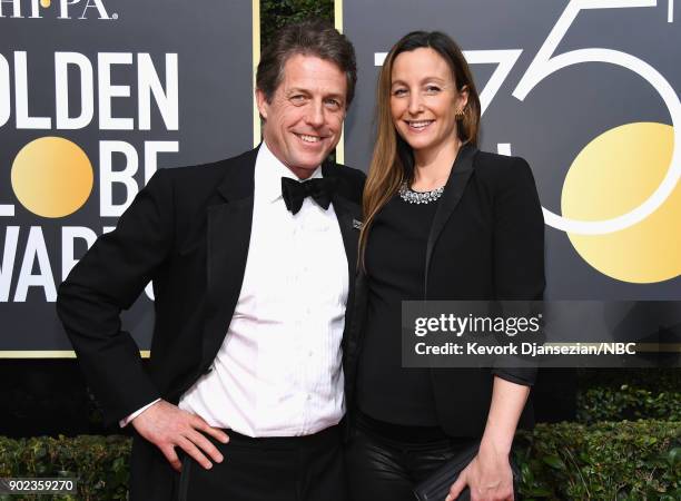 75th ANNUAL GOLDEN GLOBE AWARDS -- Pictured: Actor Hugh Grant and producer Anna Eberstein arrive to the 75th Annual Golden Globe Awards held at the...