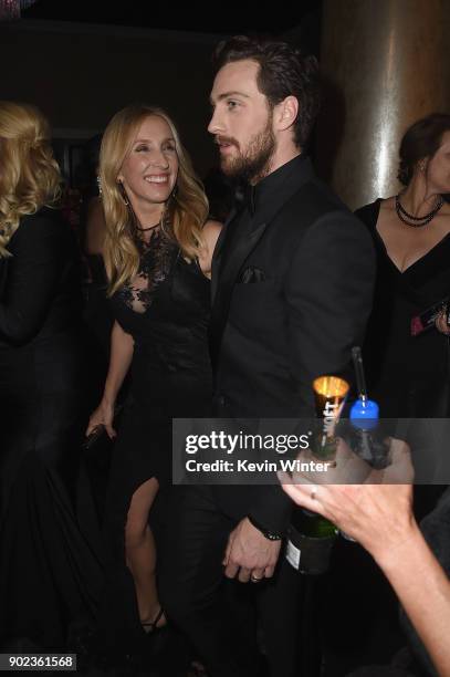 Sam Taylor-Johnson and Aaron Taylor-Johnson attends a cocktail reception during The 75th Annual Golden Globe Awards at The Beverly Hilton Hotel on...