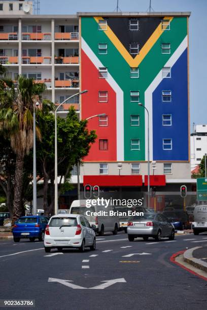 a building is painted with a south african flag mural at the end of long street in cape town, south africa - cape town cbd stock pictures, royalty-free photos & images