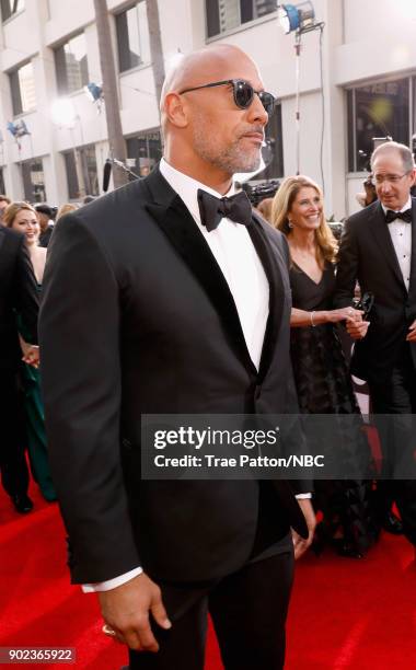 75th ANNUAL GOLDEN GLOBE AWARDS -- Pictured: Actor Dwayne 'The Rock' Johnson arrives to the 75th Annual Golden Globe Awards held at the Beverly...