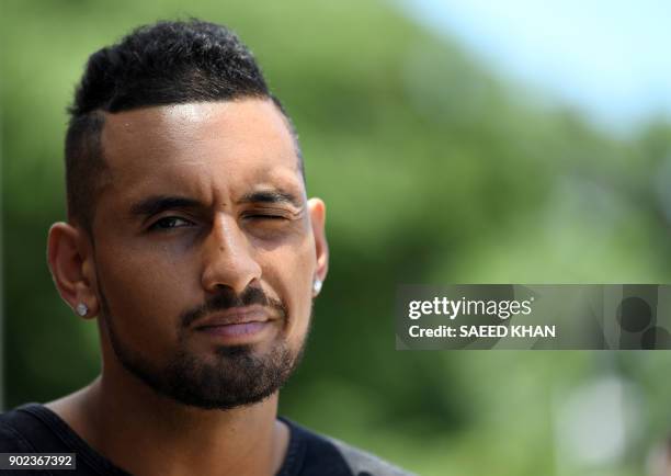 Winner of the men's singles Brisbane International tennis tournament on January 7, Nick Kyrgios of Australia, talks to the media a day after his...