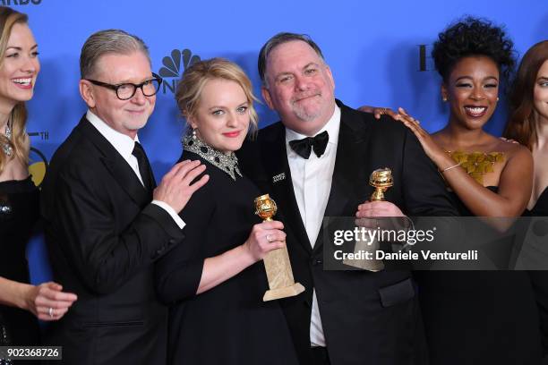 Producers Warren Littlefield, Elisabeth Moss, Bruce Miller and actor Samira Wiley of 'The Handmaid's Tale' pose with their awards for Best Television...