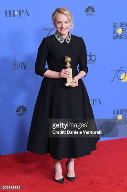 Producer Elisabeth Moss of 'The Handmaid's Tale' poses with the award for Best Television Series Drama in the press room during the 75th Annual...