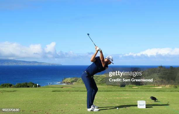 Dustin Johnson of the United States plays his shot from the 11th tee during the final round of the Sentry Tournament of Champions at Plantation...