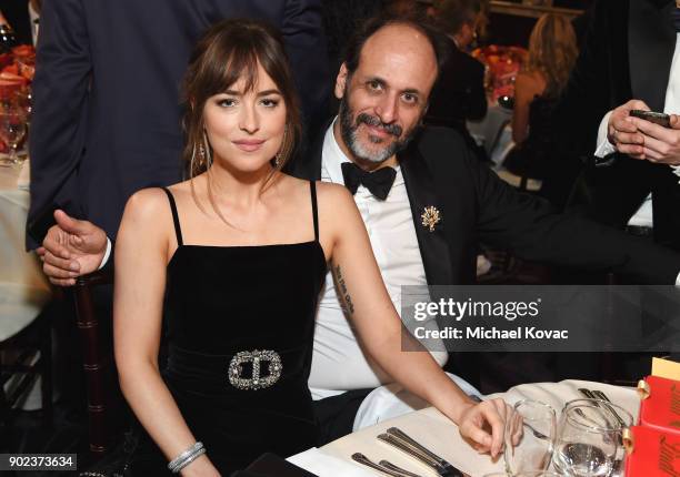 Actor Dakota Johnson and director Luca Guadagnino celebrate The 75th Annual Golden Globe Awards with Moet & Chandon at The Beverly Hilton Hotel on...