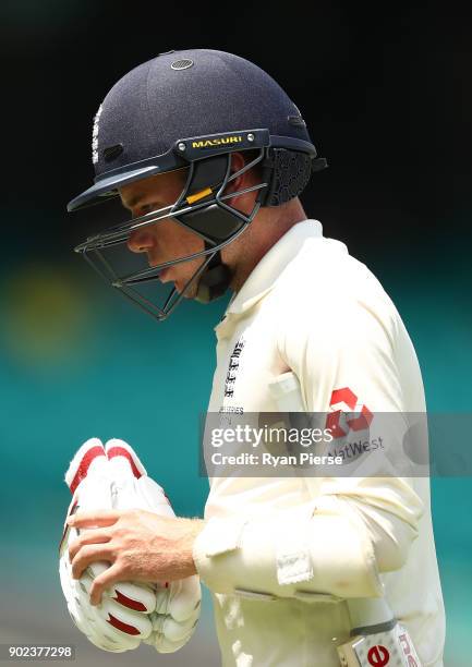 Mason Crane of England looks dejected after being dismissed by Pat Cummins of Australia during day five of the Fifth Test match in the 2017/18 Ashes...