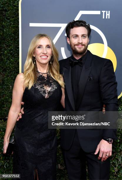 75th ANNUAL GOLDEN GLOBE AWARDS -- Pictured: Filmmaker Sam Taylor-Johnson and actor Aaron Taylor-Johnson arrive to the 75th Annual Golden Globe...
