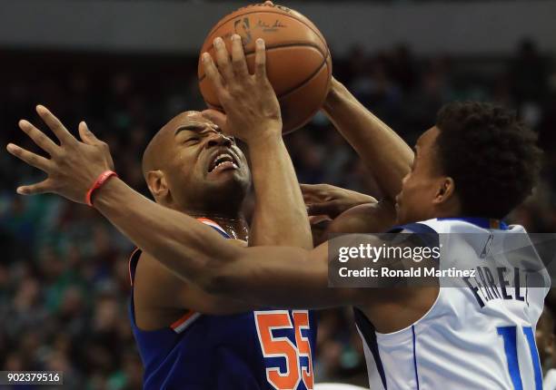 Jarrett Jack of the New York Knicks takes a shot against Yogi Ferrell of the Dallas Mavericks at American Airlines Center on January 7, 2018 in...
