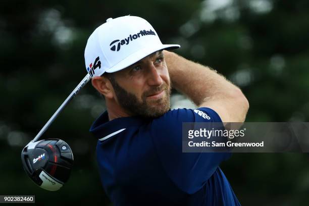 Dustin Johnson of the United States plays his shot from the 18th tee during the final round of the Sentry Tournament of Champions at Plantation...