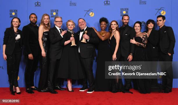 75th ANNUAL GOLDEN GLOBE AWARDS -- Pictured: The cast and crew of 'The Handmaid's Tale' poses with Best Television Series - Drama award in the press...