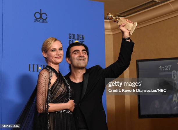 75th ANNUAL GOLDEN GLOBE AWARDS -- Pictured: Actor Diane Kruger and director Fatih Akin pose with the Best Motion Picture - Foreign Language award...