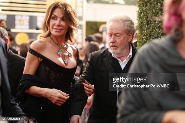 75th ANNUAL GOLDEN GLOBE AWARDS -- Pictured: Actor Giannina Facio and director Ridley Scott arrive to the 75th Annual Golden Globe Awards held at the...