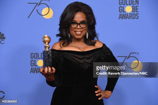 75th ANNUAL GOLDEN GLOBE AWARDS -- Pictured: Oprah Winfrey, recipient of the Cecil B. DeMille Award, poses in the press room at the 75th Annual...