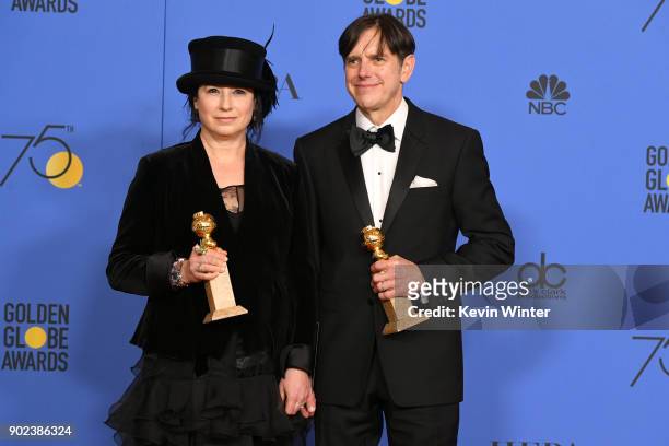 Amy Sherman-Palladino and Daniel Palladino pose with the award for Best Television Series Musical or Comedy for 'The Marvelous Mrs. Maisel' in the...