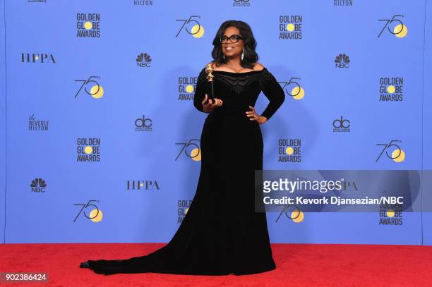 75th ANNUAL GOLDEN GLOBE AWARDS -- Pictured: Oprah Winfrey, recipient of the Cecil B. DeMille Award, poses in the press room at the 75th Annual...