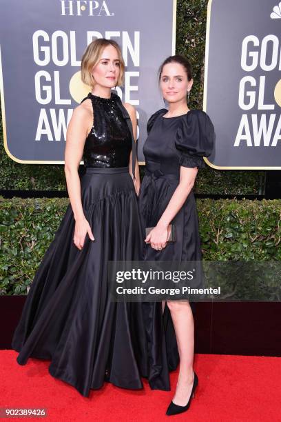 Actors Sarah Paulson and Amanda Peet attend The 75th Annual Golden Globe Awards at The Beverly Hilton Hotel on January 7, 2018 in Beverly Hills,...