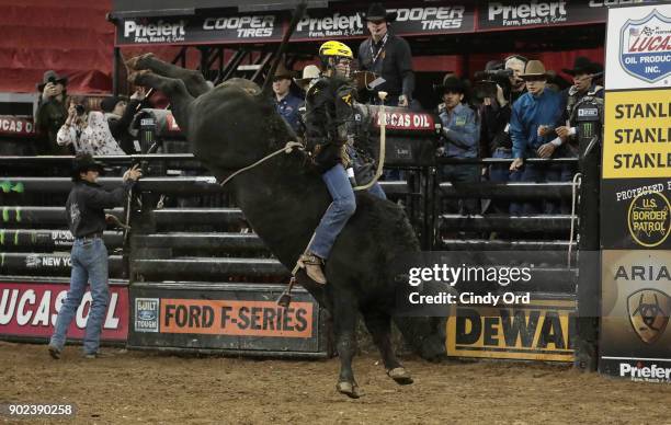 Silvano Alves rides during the 2018 Professional Bull Riders Monster Energy Buck Off at the Garden at Madison Square Garden on January 7, 2018 in New...