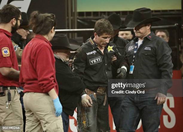 Stormy Wing is injured after being thrown from Clemon Time during the 2018 Professional Bull Riders Monster Energy Buck Off at the Garden at Madison...