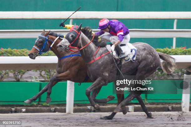 Jockey Alexis Badel riding Chater Thunder wins Race 3 Fire-Cracker Vine Handicap at Sha Tin racecourse on January 7, 2018 in Hong Kong, Hong Kong.