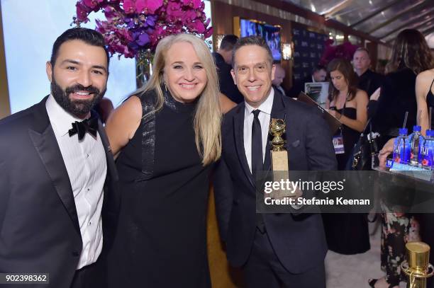 Filmmakers Adrian Molina, Darla K. Anderson and Lee Unkrich attend FIJI Water at HFPAs Official Viewing and After-Party at the Wilshire Garden...