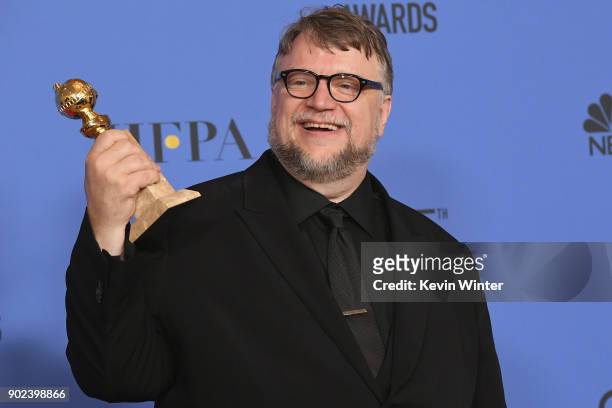 Director Guillermo del Toro poses with the award for Best Director Motion Picture for 'The Shape of Water' in the press room during The 75th Annual...