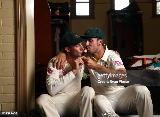 Shaun Marsh and Mitch Marsh of Australia celebrate with the Ashes Urn in the changreooms during day five of the Fifth Test match in the 2017/18 Ashes...