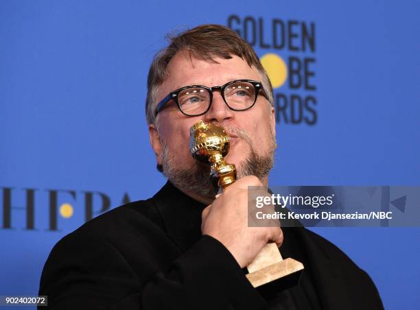 75th ANNUAL GOLDEN GLOBE AWARDS -- Pictured: Director Guillermo del Toro poses with the Best Director - Motion Picture award for 'The Shape of Water'...