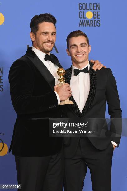 Dave Franco poses with James Francoand his award for Best Performance by an Actor in a Motion Picture Musical or Comedy in 'The Disaster Artist' in...