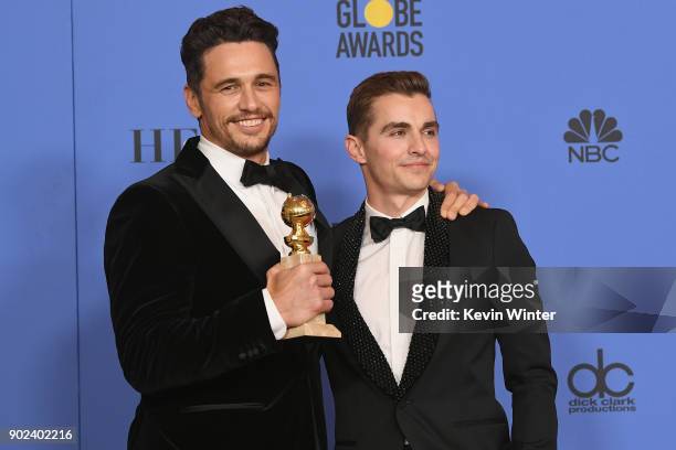 Dave Franco poses with James Francoand his award for Best Performance by an Actor in a Motion Picture Musical or Comedy in 'The Disaster Artist' in...