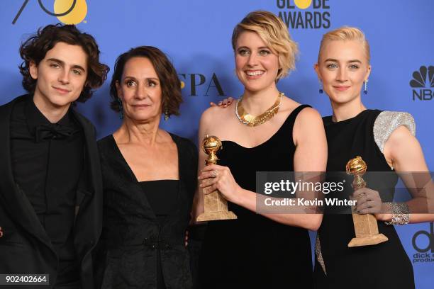 Timothee Chalamet, Laurie Metcalf, Greta Gerwig and Saoirse Ronan poses with the award for Best Motion Picture Musical or Comedy in 'Lady Bird' in...