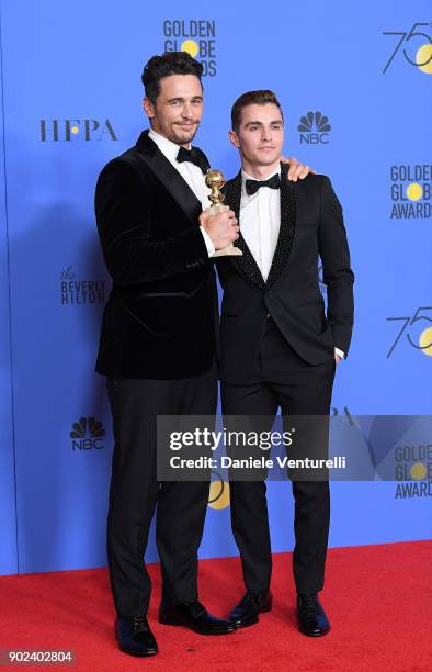 Actor James Franco poses with Best Performance by an Actor in a Motion Picture - Musical or Comedy award for 'The Disaster Artist', with actor Dave...