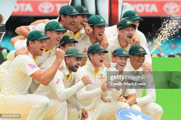 The Australians pose for a team photo after winning the Ashes during day five of the Fifth Test match in the 2017/18 Ashes Series between Australia...