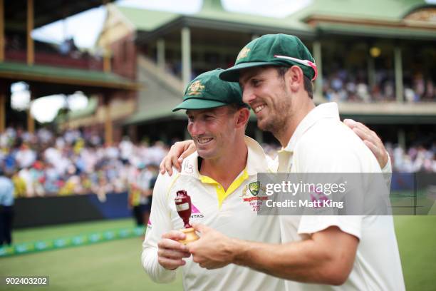 Shaun Marsh and Mitchell Marsh of Australia celebrate winning the Ashes during day five of the Fifth Test match in the 2017/18 Ashes Series between...