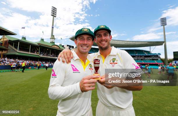 Australia's Shaun and Mitch Marsh celebrate winning the ashes during day five of the Ashes Test match at Sydney Cricket Ground.