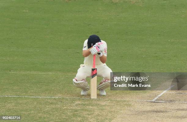 Joe Root of England feeling unwell at the crease during day five of the Fifth Test match in the 2017/18 Ashes Series between Australia and England at...