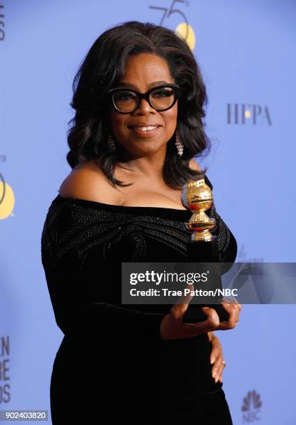 75th ANNUAL GOLDEN GLOBE AWARDS -- Pictured: Oprah Winfrey, recipient of the Cecil B. DeMille Award, poses in the press room at the 75th Annual...