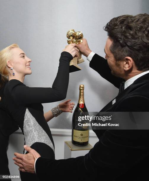 Actors Saoirse Ronan and James Franco celebrate The 75th Annual Golden Globe Awards with Moet & Chandon at The Beverly Hilton Hotel on January 7,...